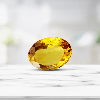 natural yellow sapphire gemstone for sale at ganesh jewellers